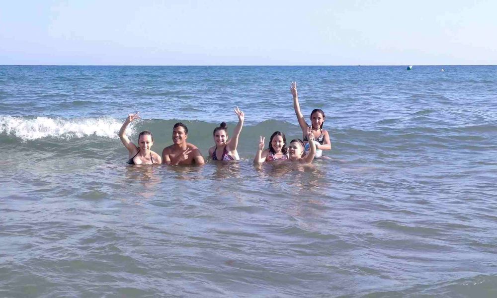 Summer camp in Spain - going to the beach with friends