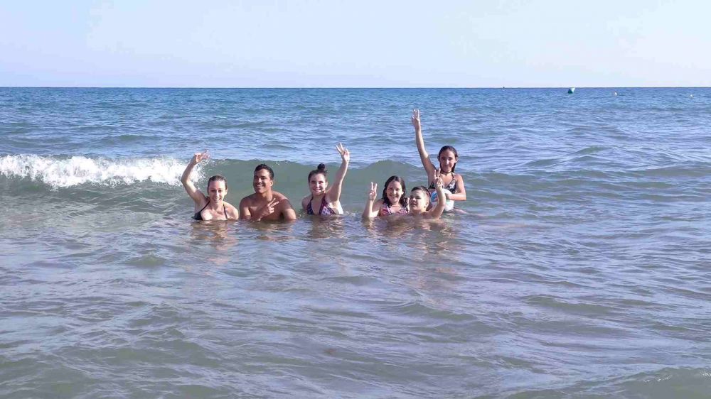 Summer camp in Spain - going to the beach with friends