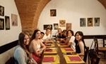Campamento de verano en la playa en Italia: ir a un restaurante durante las excursiones
